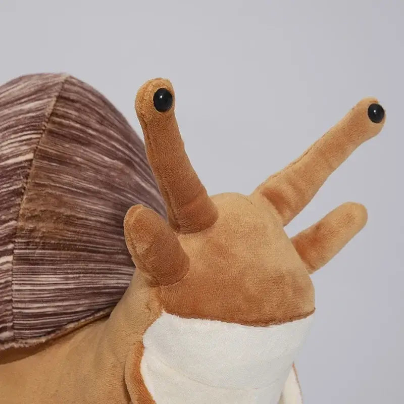 brown snail stuffed animal