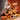 A collection of decorative Halloween pumpkins with witch hats and smiling faces.