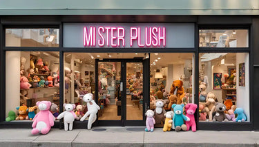 Storefront of a plush toy shop called ’Mister Plush’ with stuffed animals displayed in the windows and entrance.